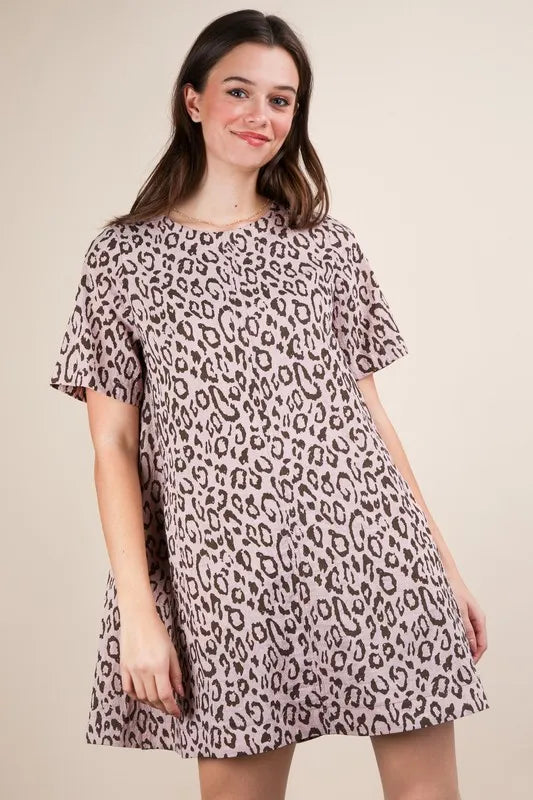 Leopard printed Very J mini dress by Trendsi, featuring a comfy, relaxed fit with blush pink accents and short sleeves.