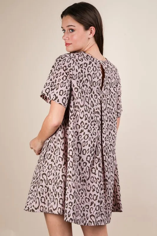 Leopard printed comfy mini dress from VERY J by Trendsi, blush pink color, fitted style with short sleeves and scoop neckline.
