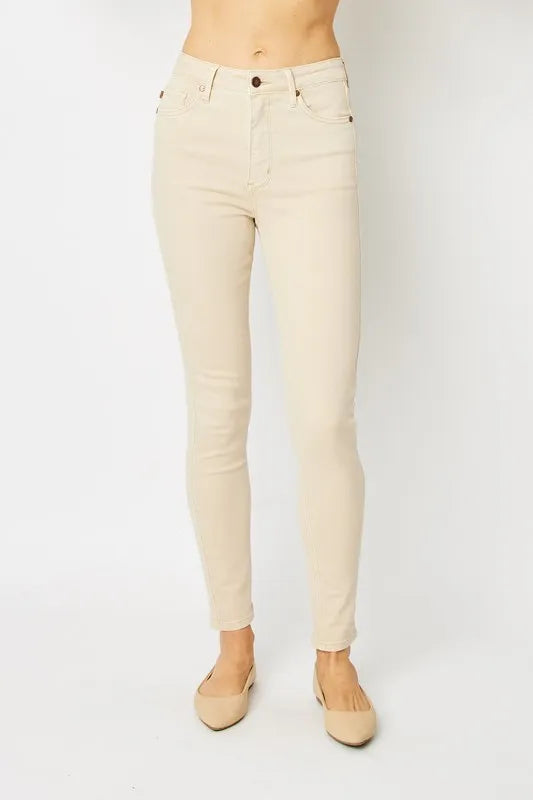 Full-body image of Judy Blue brand full-size garment-dyed tummy control skinny jeans, showcasing fit and denim texture.