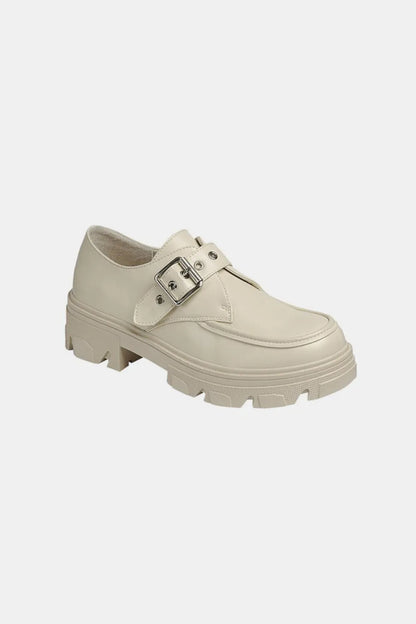 Bone-colored Forever Link Buckled Platform Lug Sole Loafers by Trendsi, showing the stylish loafer with buckle detail and chunky sole.
