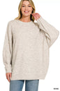 Zenana oversized round neck melange sweater with exposed seams, in a cozy, textured knit, perfect for casual stylish wear.