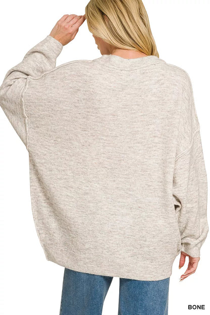 Light gray Zenana oversized round neck sweater with exposed seams and melange texture, styled casually.