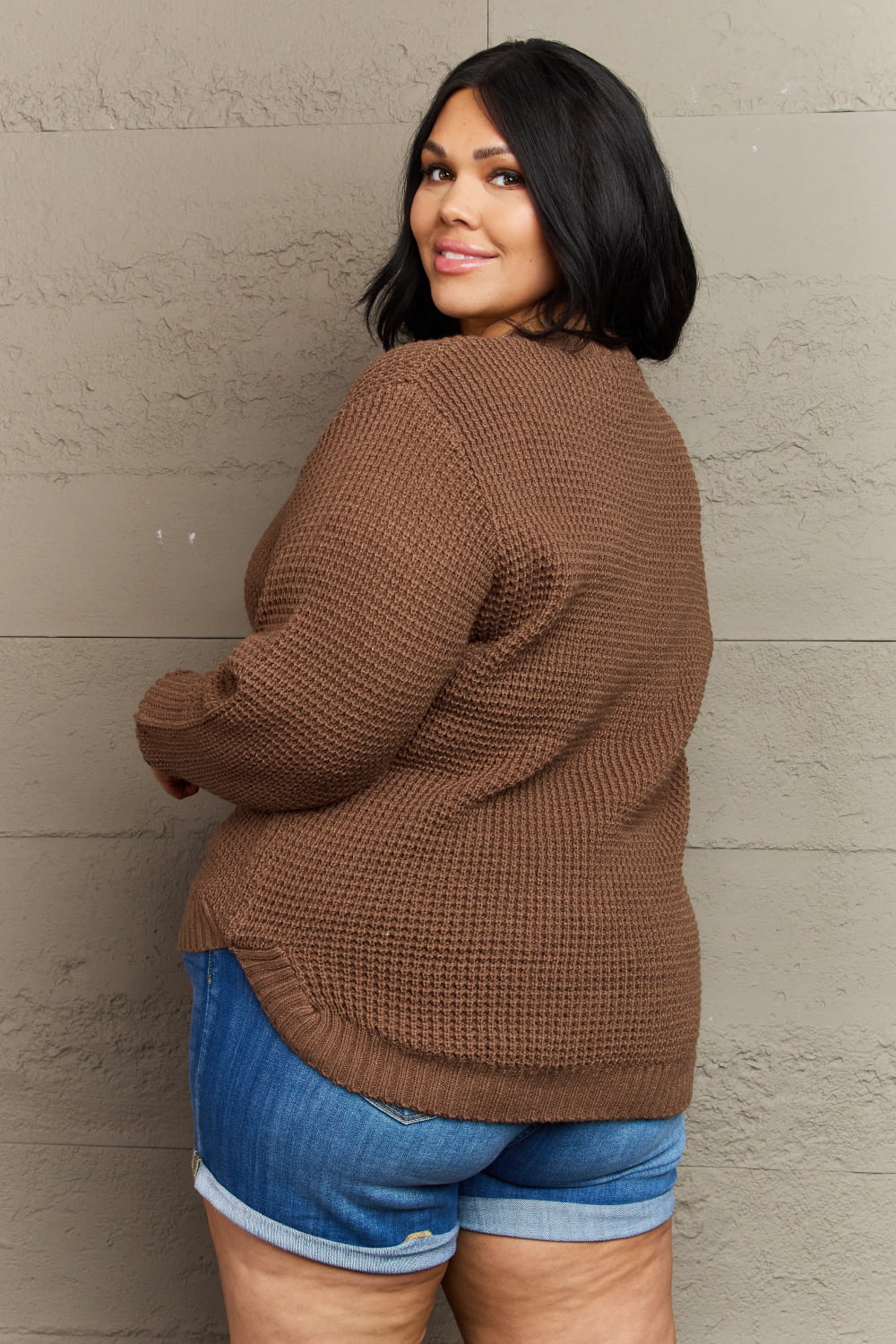 Plus size brown waffle knit high-low sweater from Zenana Breezy Days collection, featuring a cozy, relaxed fit and stylish design.