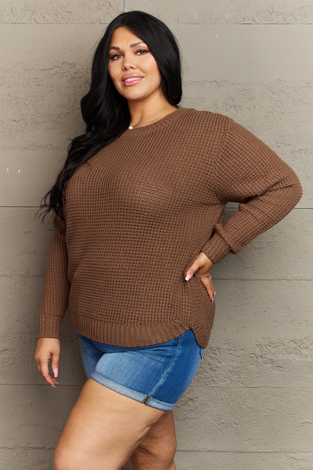 Plus size brown waffle knit high-low sweater from Zenana's Breezy Days collection, featuring a cozy, relaxed fit and stylish design.