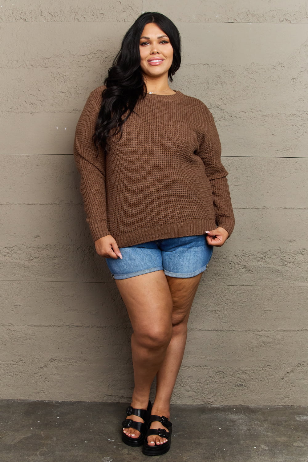 Plus size Zenana Breezy Days high-low waffle knit sweater in brown, featuring a cozy, textured fabric and relaxed fit.