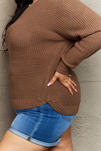 Plus size Zenana Breezy Days high-low waffle knit sweater in brown, featuring a cozy, textured design and relaxed fit.