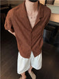 Men's plus size textured knit short-sleeve shirt in brown by Trendsi, shown on a model with a casual fit and comfortable fabric.