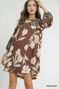 Brown floral high-low babydoll dress by Umgee, featuring a flowy silhouette and floral pattern, perfect for casual or dressy occasions.