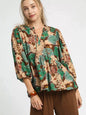 Brown Umgee floral peplum blouse with tie neck and long sleeves, stylish women's top with a mixed floral pattern.