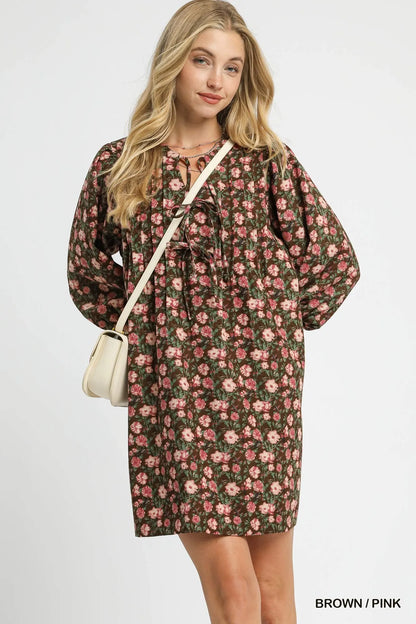 Brown and pink floral Umgee tie-neck babydoll dress with long sleeves and a relaxed fit.