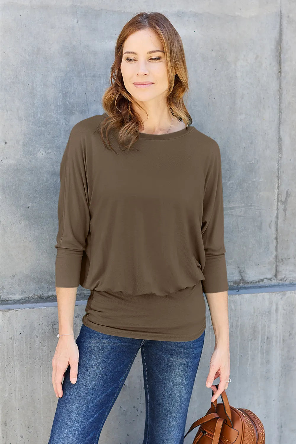 Trendsi Basic Bae brown full-size round neck batwing sleeve top, casual style, soft fabric, relaxed fit, on a flat lay.