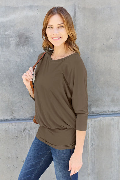 Trendsi Basic Bae brown full-size round neck batwing sleeve top, casual women's top with relaxed fit and long batwing sleeves.