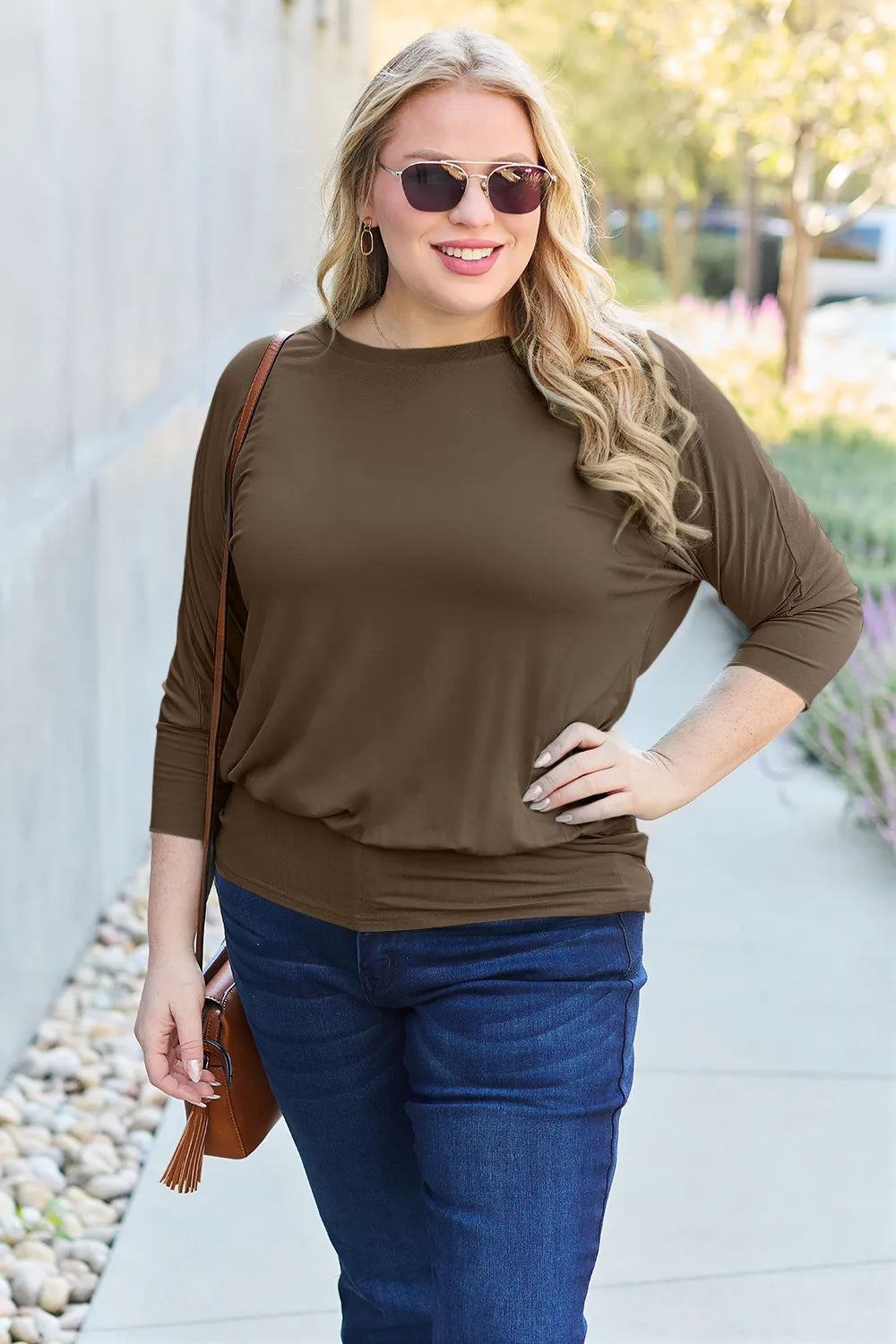Brown Basic Bae full-size round neck batwing sleeve top from Trendsi, showcasing its relaxed fit and stylish design.