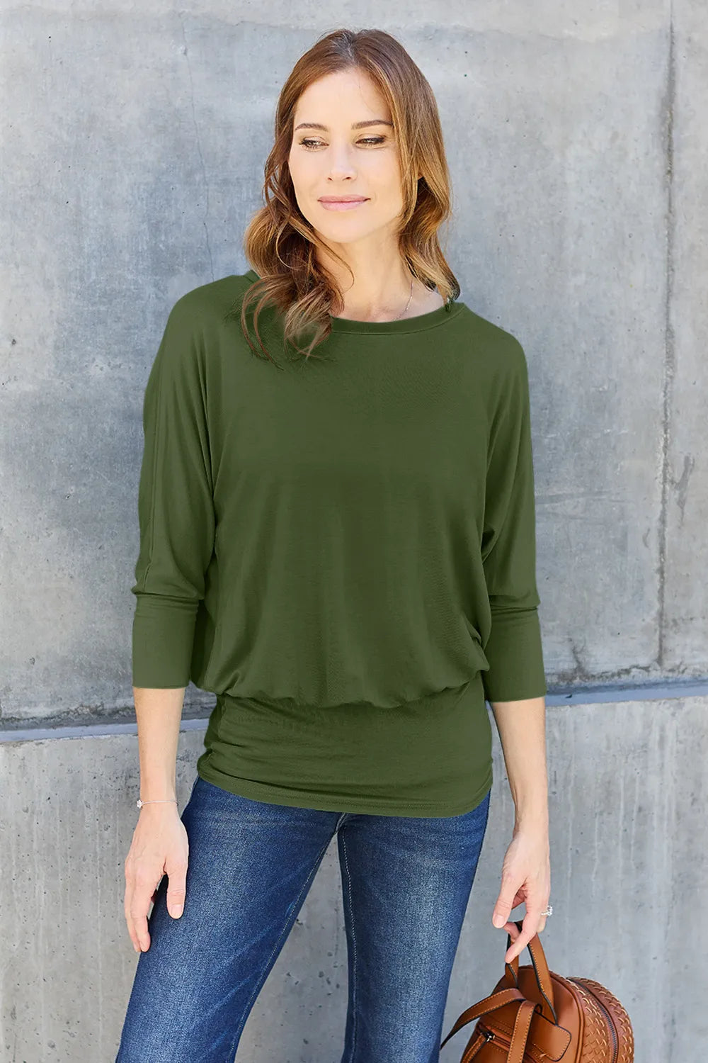 Brown Basic Bae full-size round neck batwing sleeve top by Trendsi, showcasing a loose fit and stylish batwing sleeves.