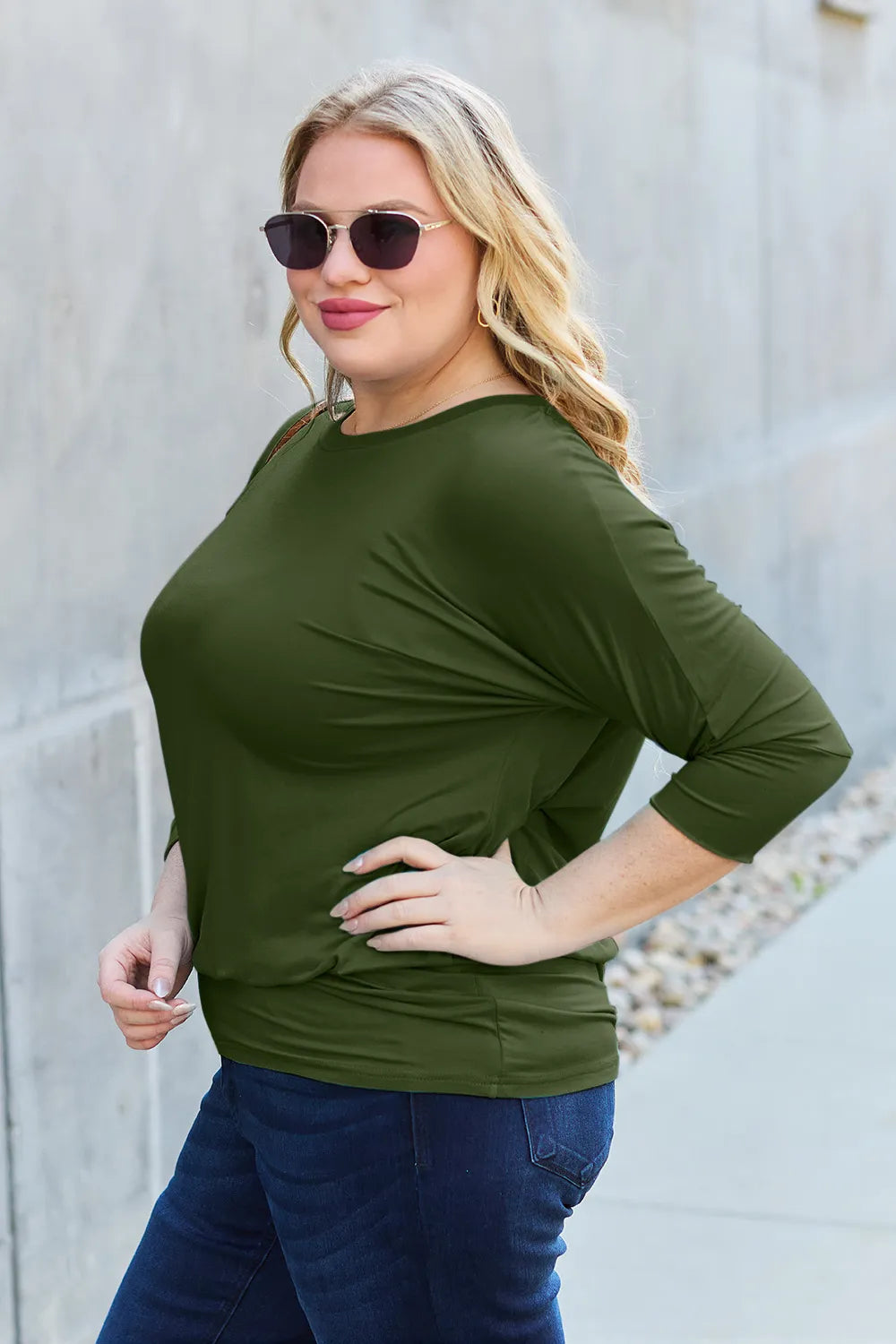 Brown Trendsi Basic Bae full-size round neck batwing sleeve top displayed on a model, showcasing relaxed fit and casual style.