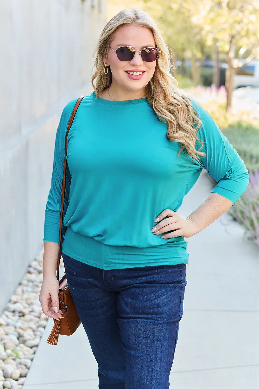 Brown Basic Bae full-size round neck batwing sleeve top from Trendsi, showcasing its relaxed fit and comfortable style.