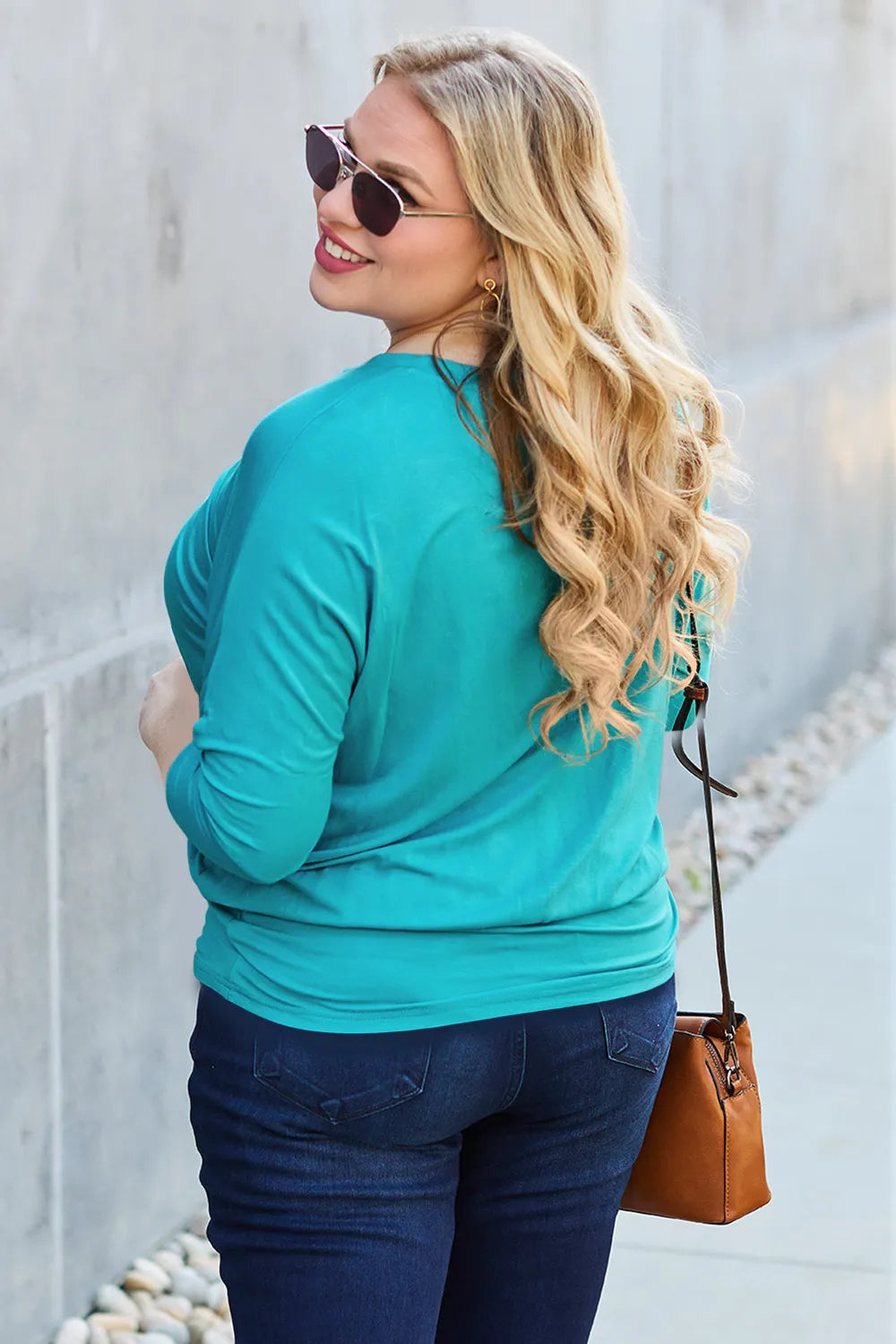 Brown Basic Bae full-size round neck batwing sleeve top by Trendsi, shown on a model with relaxed fit and comfortable design.