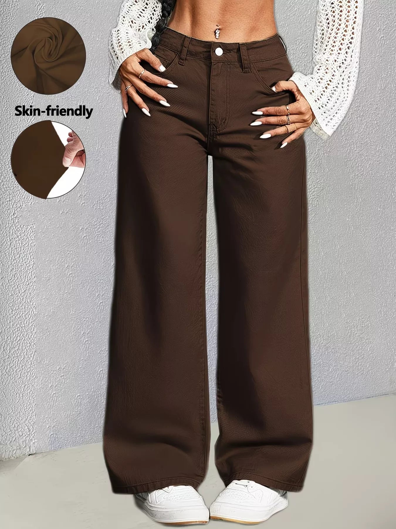 High-waisted wide-leg jeans in brown from Trendsi, showcasing a relaxed fit and classic denim style.