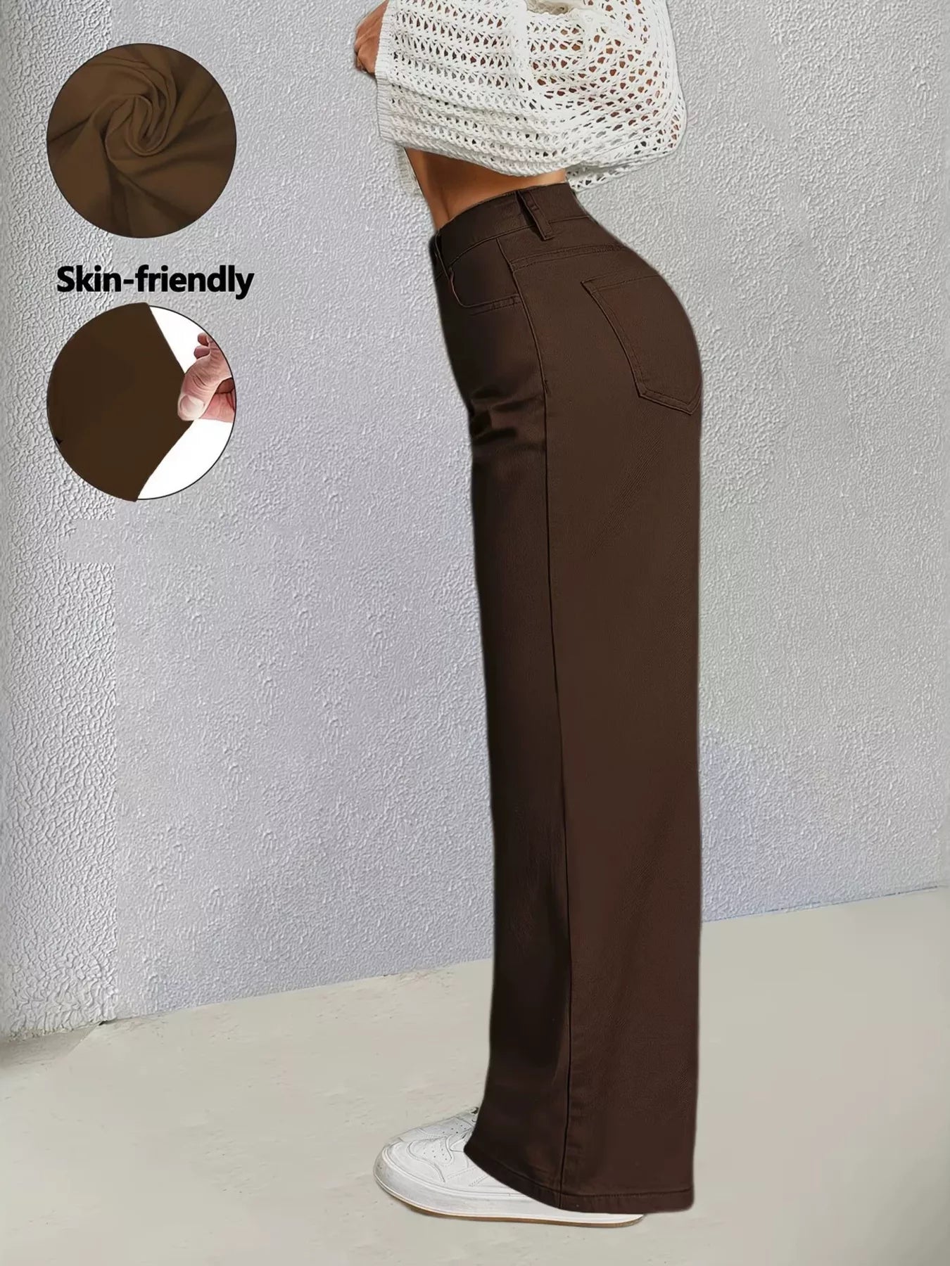 Brown high-waisted wide-leg jeans from Trendsi, showcasing a relaxed fit and stylish silhouette against a plain background.