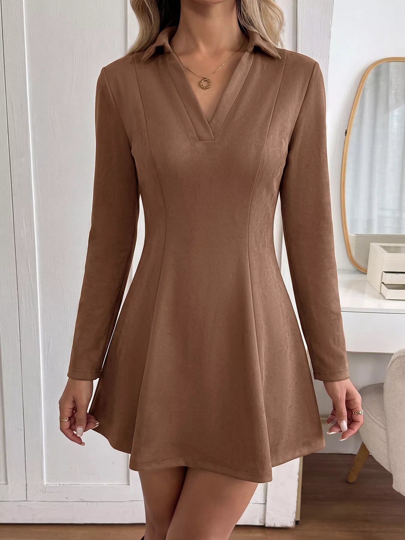 Brown Johnny collar long sleeve dress by Trendsi, showing a stylish dress with a button-down front and a fitted silhouette.
