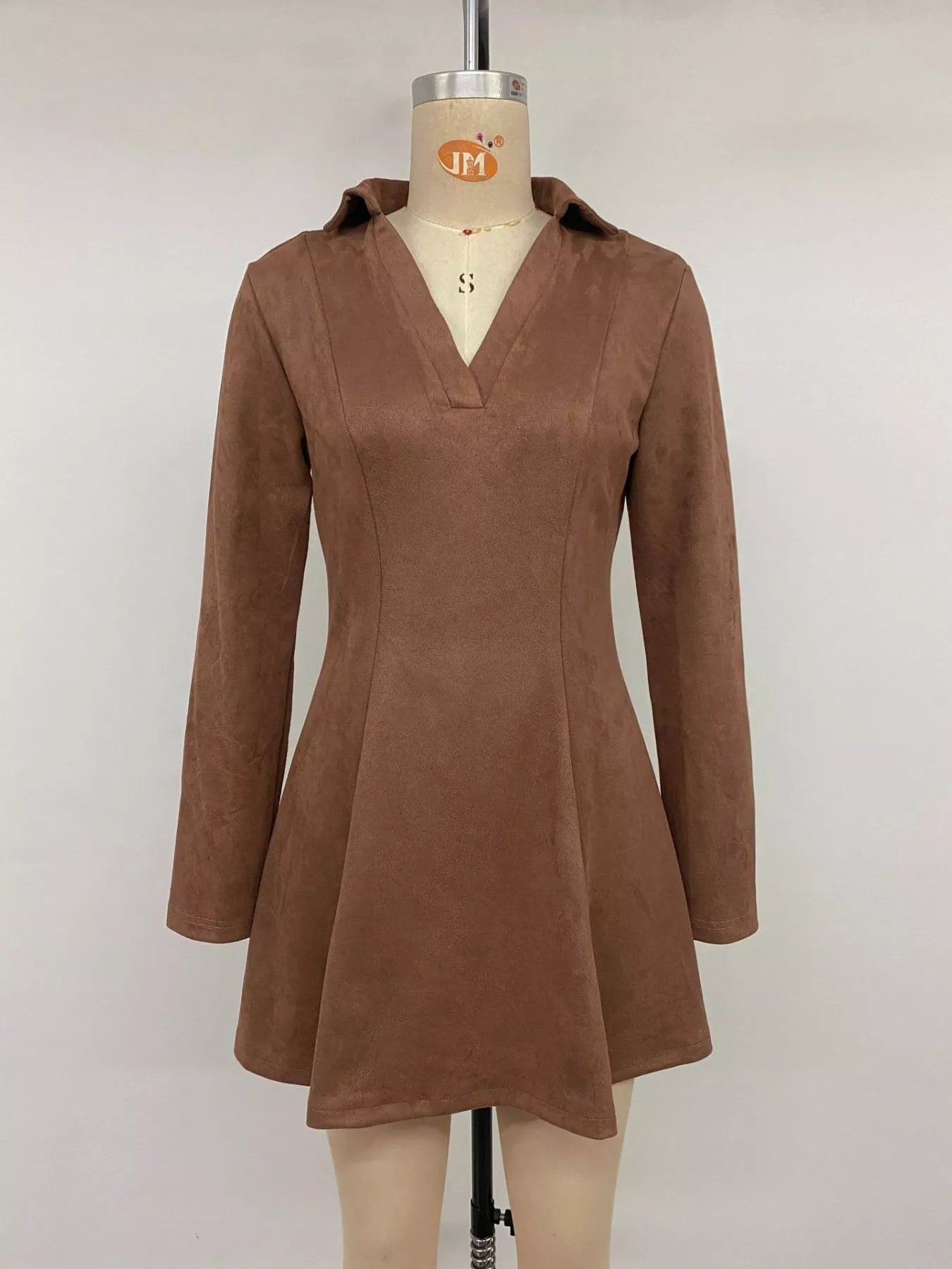 Brown Johnny Collar long sleeve dress by Trendsi, featuring a classic collar and fitted silhouette, shown on a model.