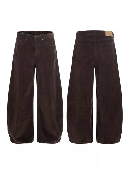Men's wide leg corduroy pants in brown by Trendsi, featuring a relaxed fit and textured fabric, styled for casual wear.