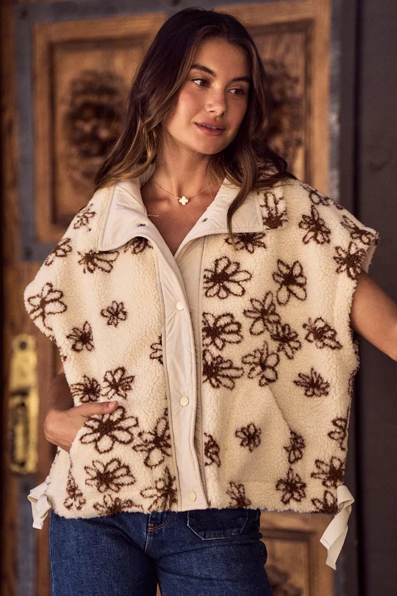 Brown SO ME Flower Sherpa Fur oversized sleeveless vest jacket with plush Sherpa lining and floral design details.