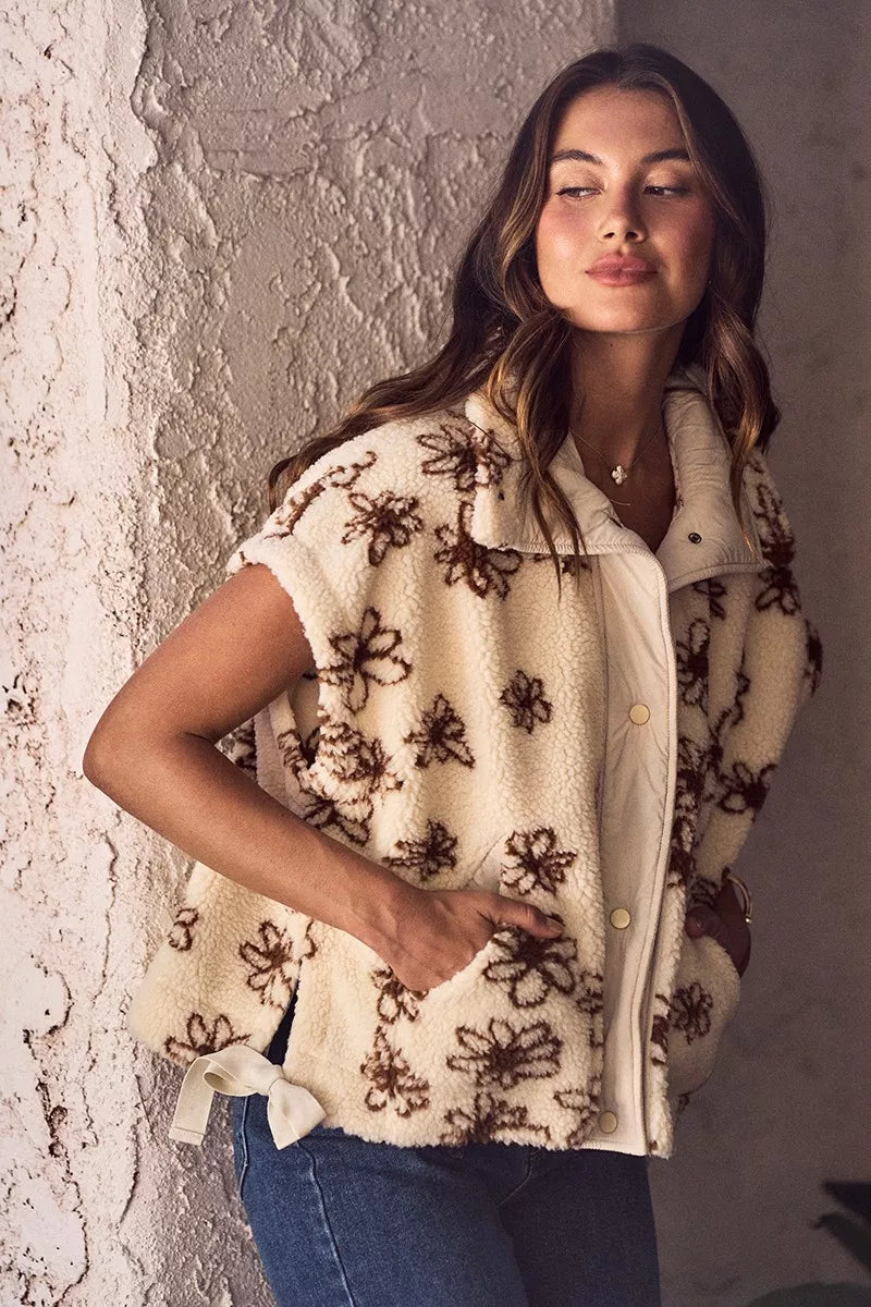 Brown SO ME Flower Sherpa Fur oversized sleeveless vest jacket with plush Sherpa lining and floral design by Trendsi.