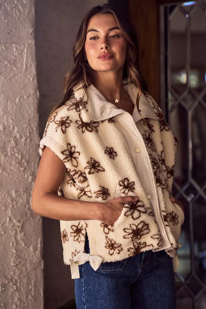 Brown SO ME Flower Sherpa Fur oversized sleeveless vest jacket with plush sherpa lining and floral design, by Trendsi.
