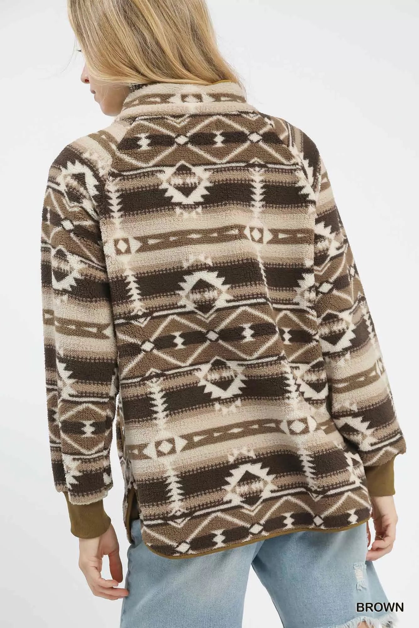 Brown Umgee Aztec print sherpa pullover featuring a cozy, patterned design perfect for casual winter wear.