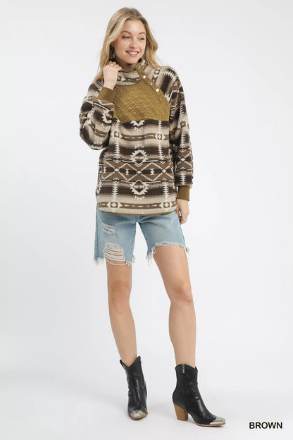 Brown Umgee Aztec print Sherpa pullover with cozy, textured fabric and a relaxed fit, perfect for casual wear.