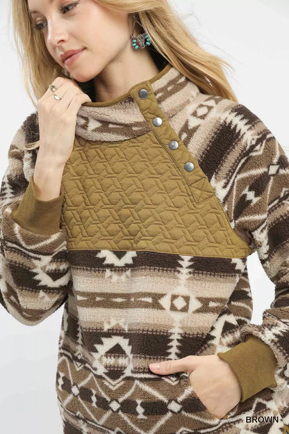 Brown Umgee Aztec print sherpa pullover with cozy fleece lining, featuring a stylish Aztec pattern and casual fit.
