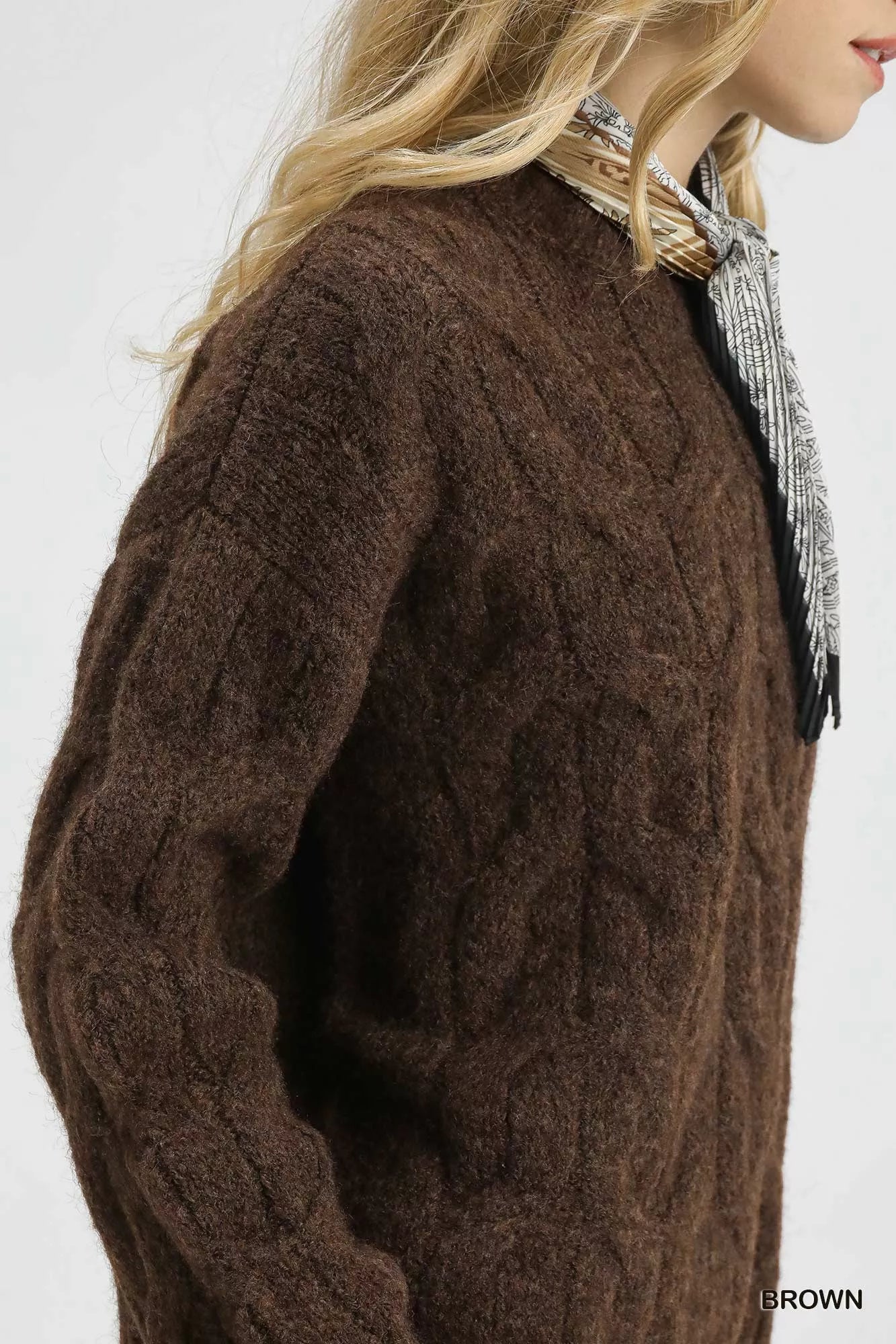 Brown Umgee cable knit cozy sweater by Trendsi, featuring a warm, textured knit design and relaxed fit for comfortable style.