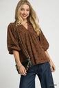 Brown Umgee corduroy blouse with bow print, balloon sleeves, and a stylish, relaxed fit.