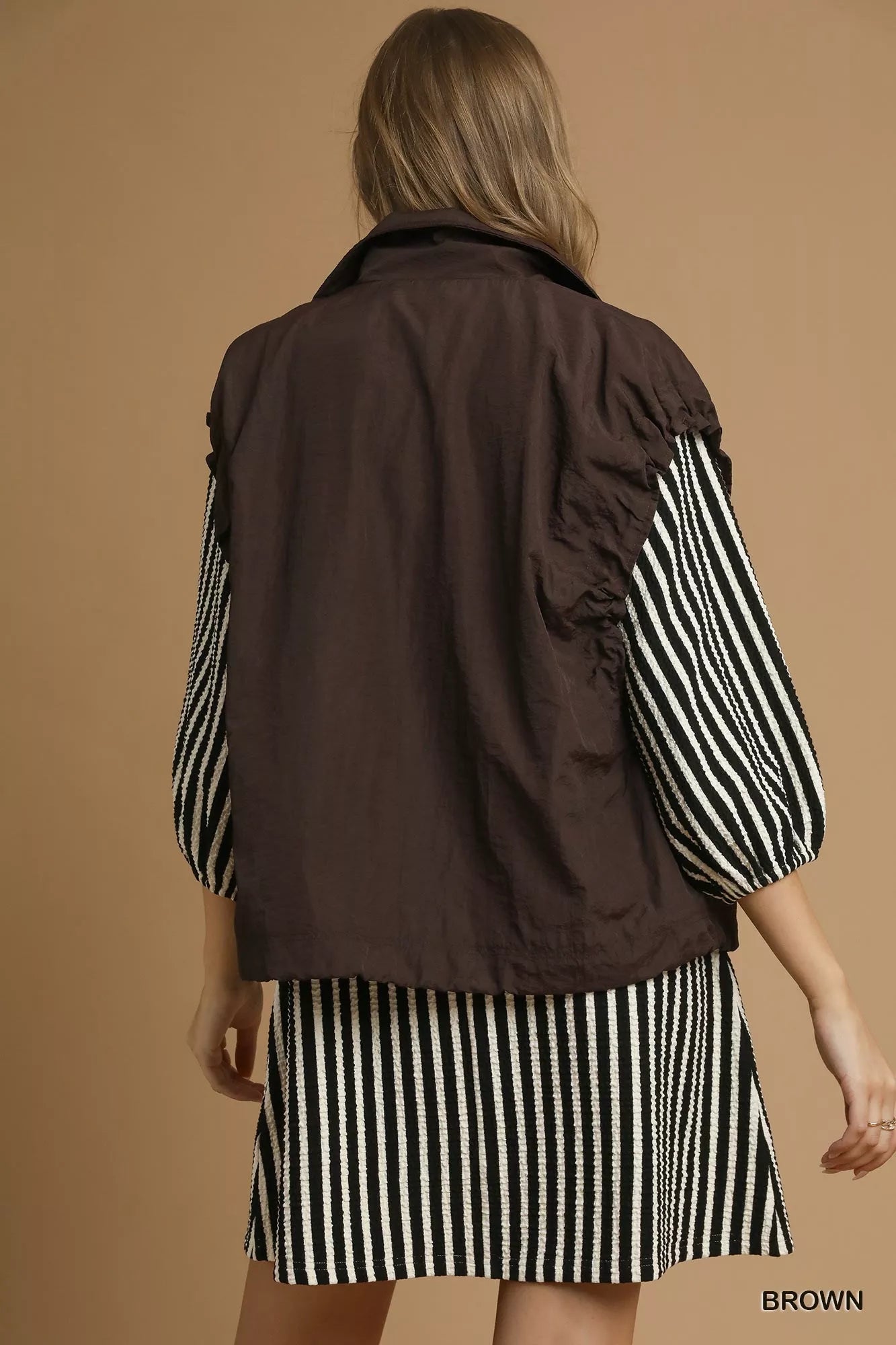 Brown Umgee nylon vest with front pockets, casual sleeveless design, featuring a lightweight, practical style for layering.