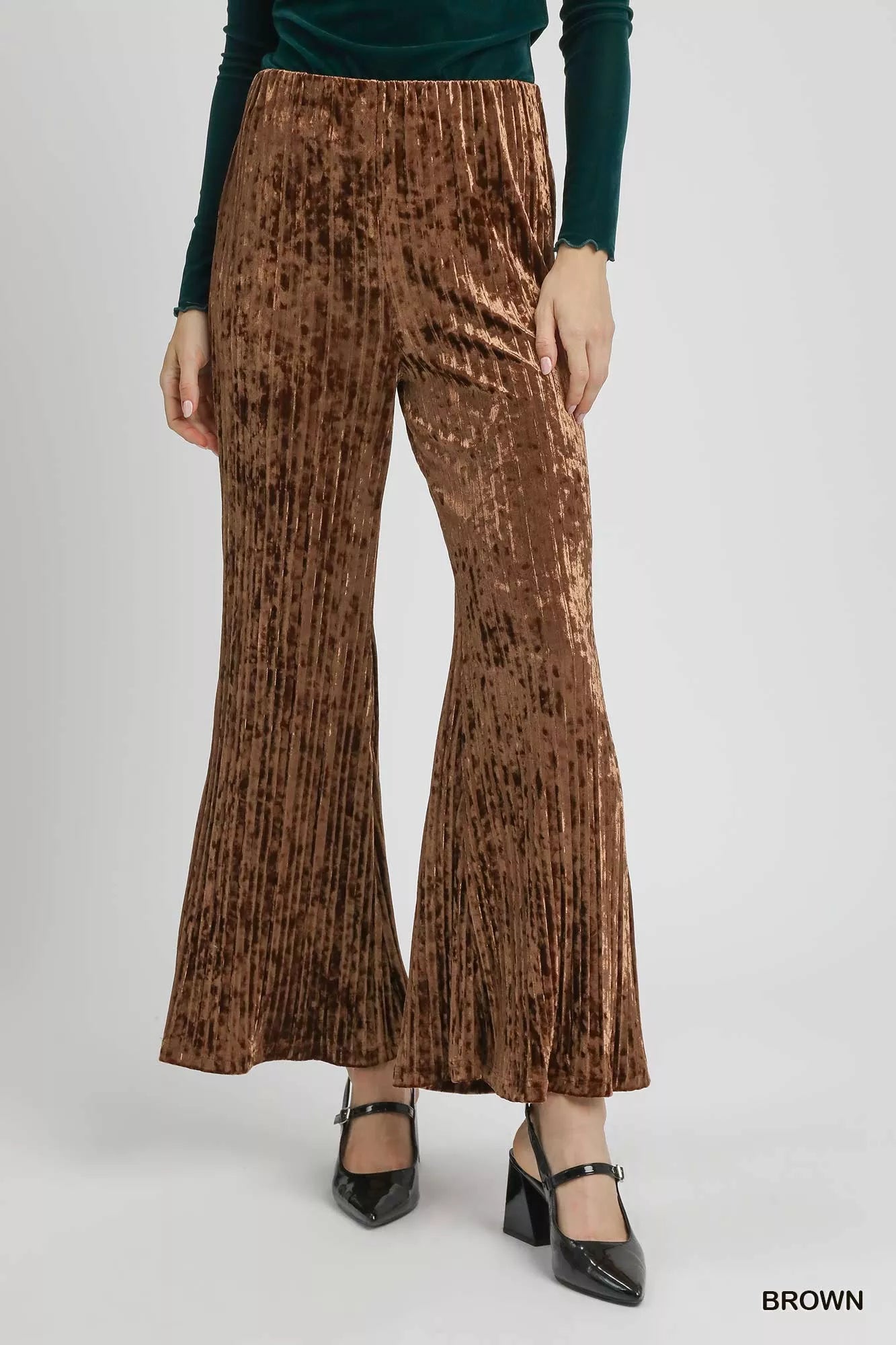 Brown Umgee velvet pleated wide-leg pants with a relaxed fit and high-waist design, showcased on a model.