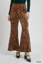 Brown Umgee velvet pleated wide-leg pants with a relaxed fit and high-waist design, showcased on a model.