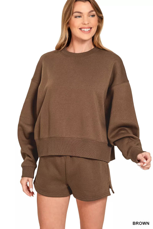 Brown Zenana fleece sweatshirt and shorts set with round neck, casual loungewear by Trendsi, shown on a model.