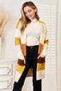 Woven brown and tan color block dropped shoulder cardigan with a relaxed fit, featuring a stylish right side design by Trendsi.