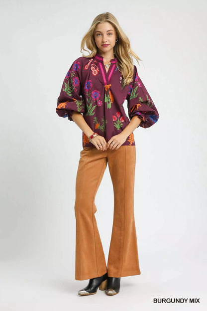 Umgee floral print flounce sleeve blouse in burgundy mix, featuring lightweight fabric and feminine design.