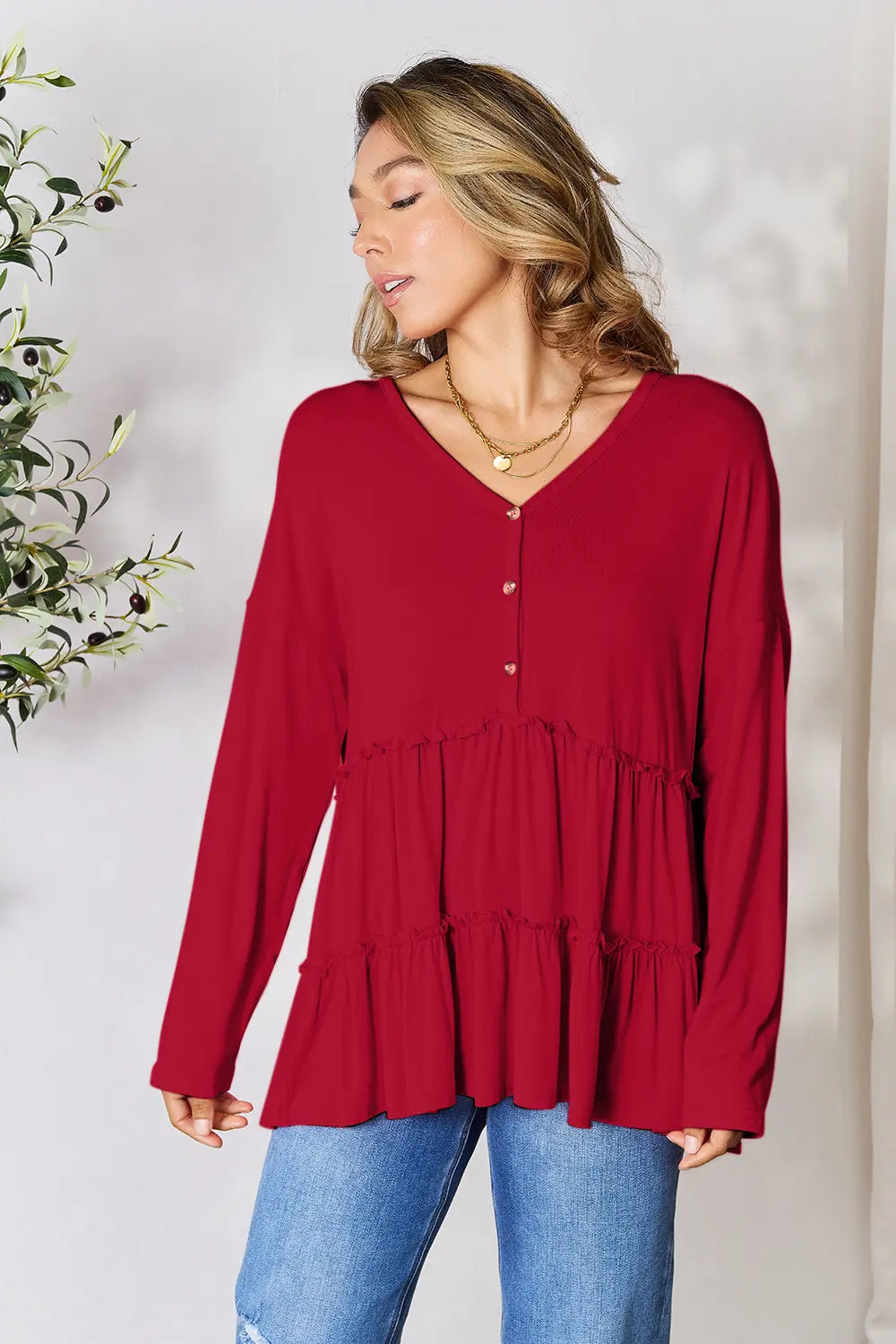 Burgundy Trendsi Double Take half-button long sleeve blouse with ruffle hem and classic collar, stylish and feminine.
