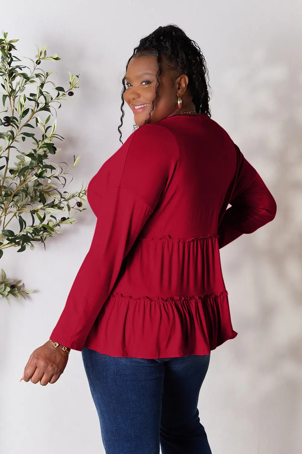 Burgundy Trendsi double take half-button long sleeve blouse with ruffle hem, stylish and feminine for versatile wear