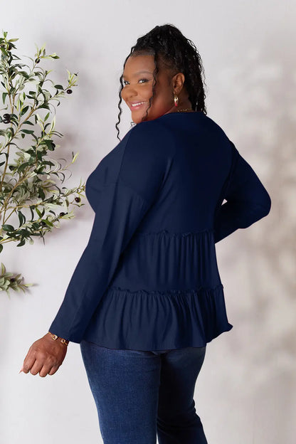 Burgundy Trendsi Double Take half-button long sleeve blouse with ruffle hem, stylish and feminine for casual or dressy wear.