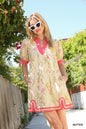 Umgee floral puff sleeve dress with contrast trim, featuring a feminine design and vibrant floral pattern.