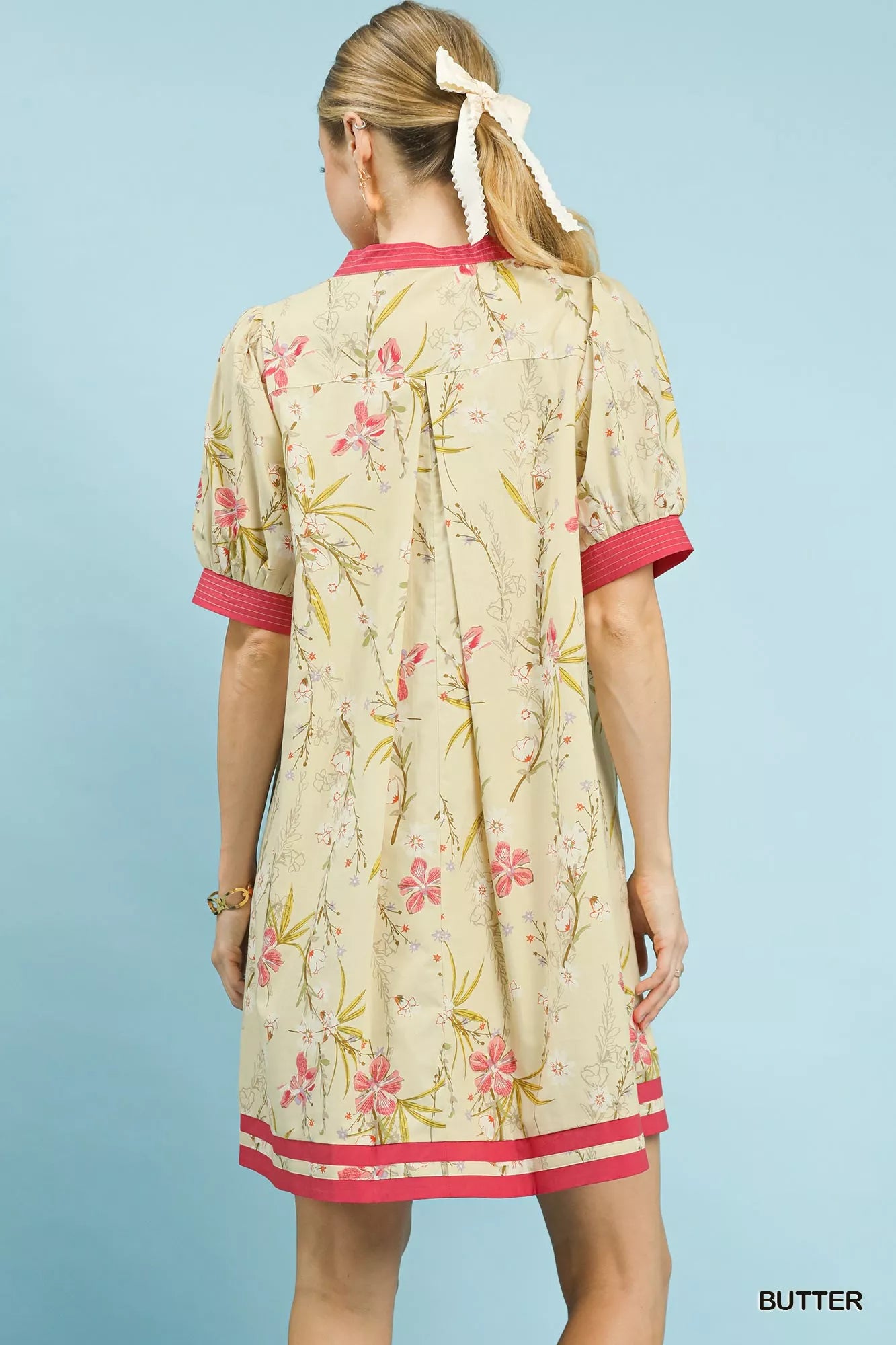 Umgee floral puff sleeve dress with contrast trim, featuring a feminine design and stylish floral pattern, perfect for casual wear.