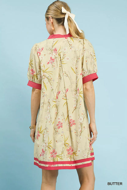 Umgee floral puff sleeve dress with contrast trim, featuring a feminine design and stylish floral pattern, perfect for casual wear.