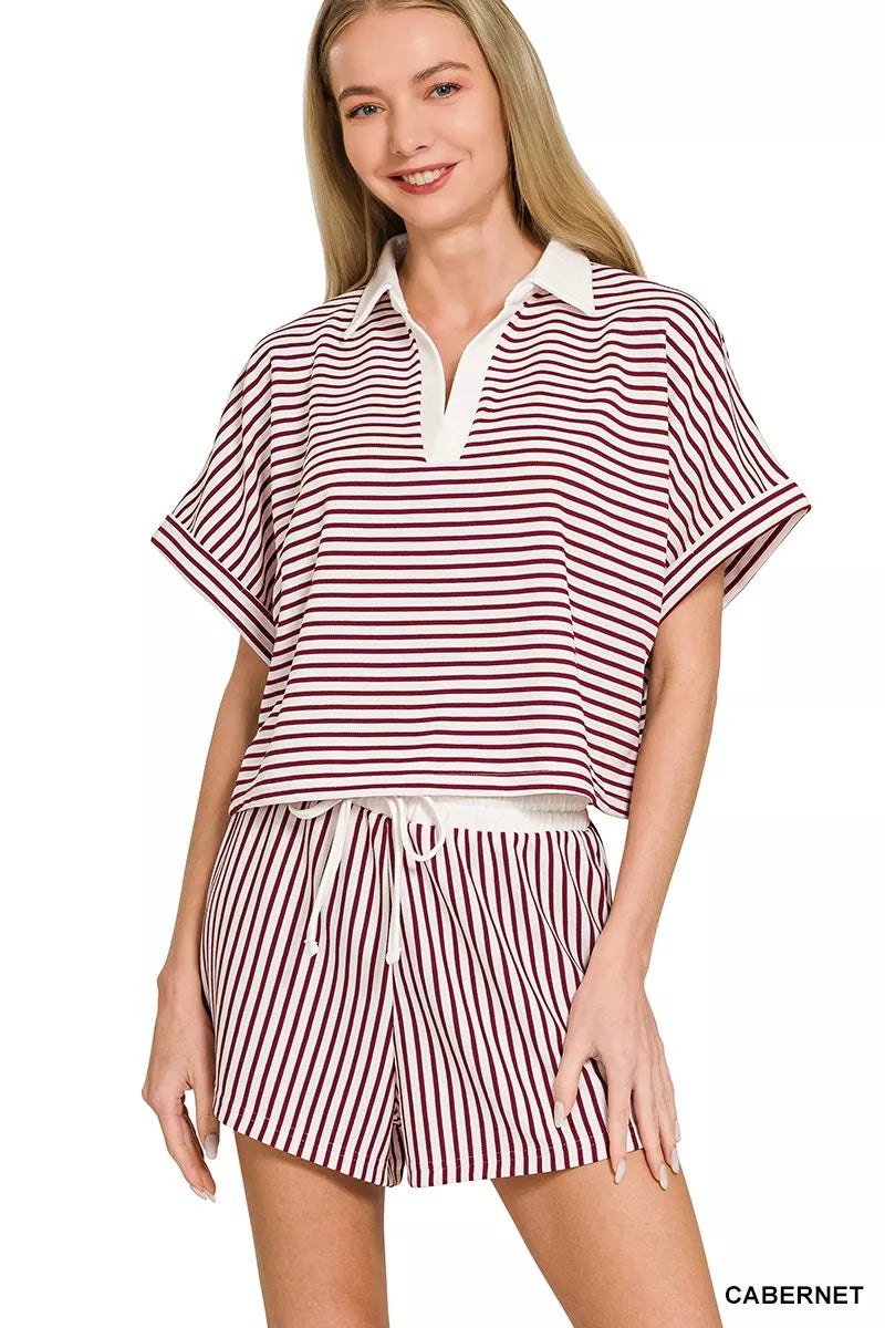 Zenana striped collared top and shorts set by Trendsi, featuring a casual, stylish design with vertical stripes and a comfortable fit.