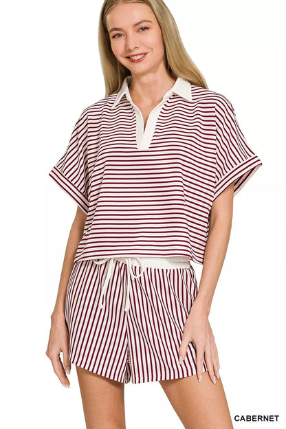 Zenana striped collared top and shorts set by Trendsi, featuring a casual, stylish design with vertical stripes and a comfortable fit.