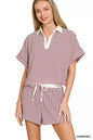 Zenana striped collared top and shorts set by Trendsi, featuring a casual, stylish design with vertical stripes and a comfortable fit.