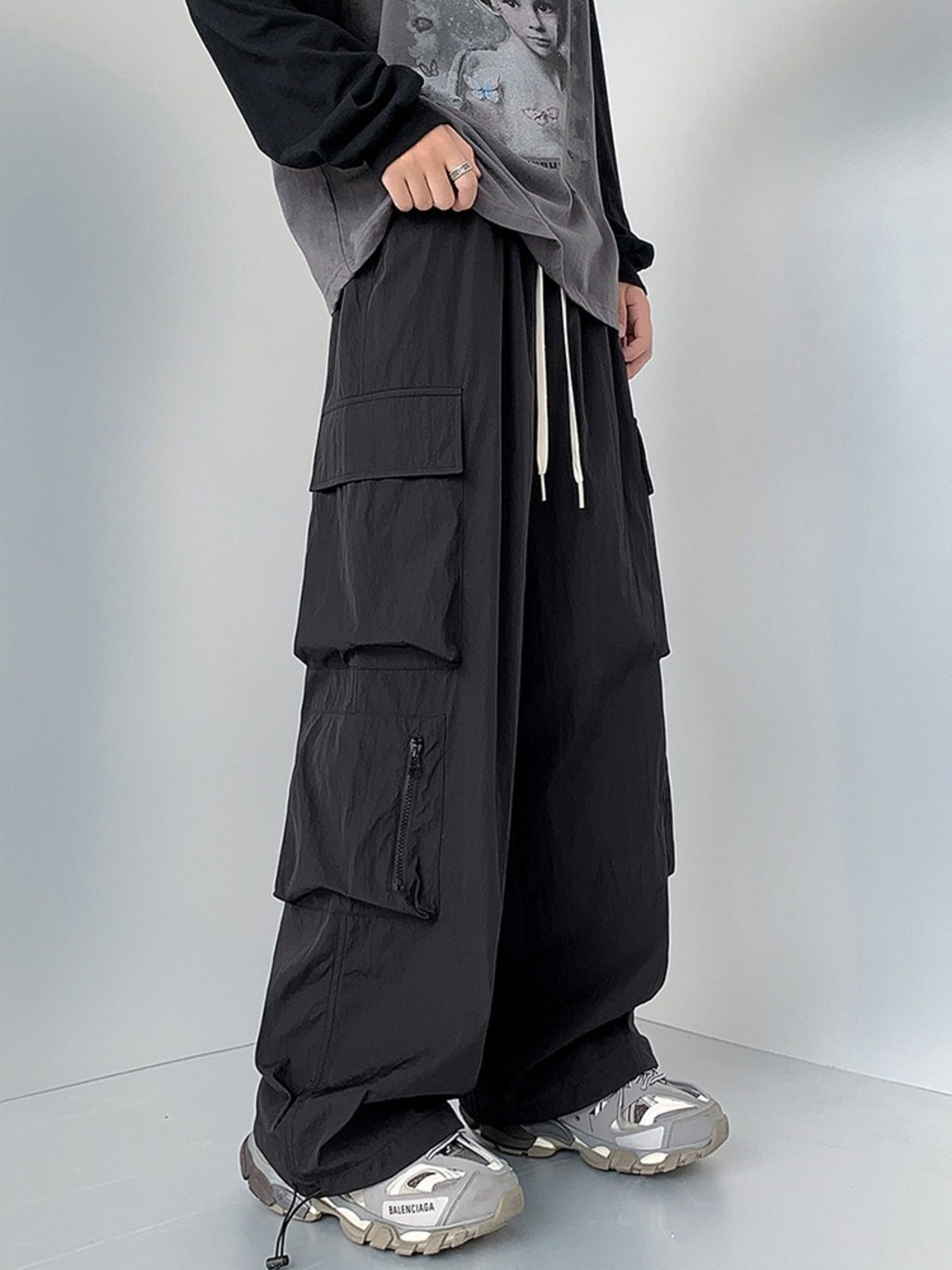 Men's plus size loose fit cargo pants with drawstring in camel color, stylish and comfortable by Trendsi.
